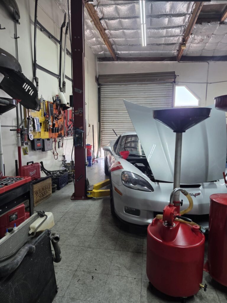diy-auto-repair-in-phoenix-two-post-lift-garage-bay